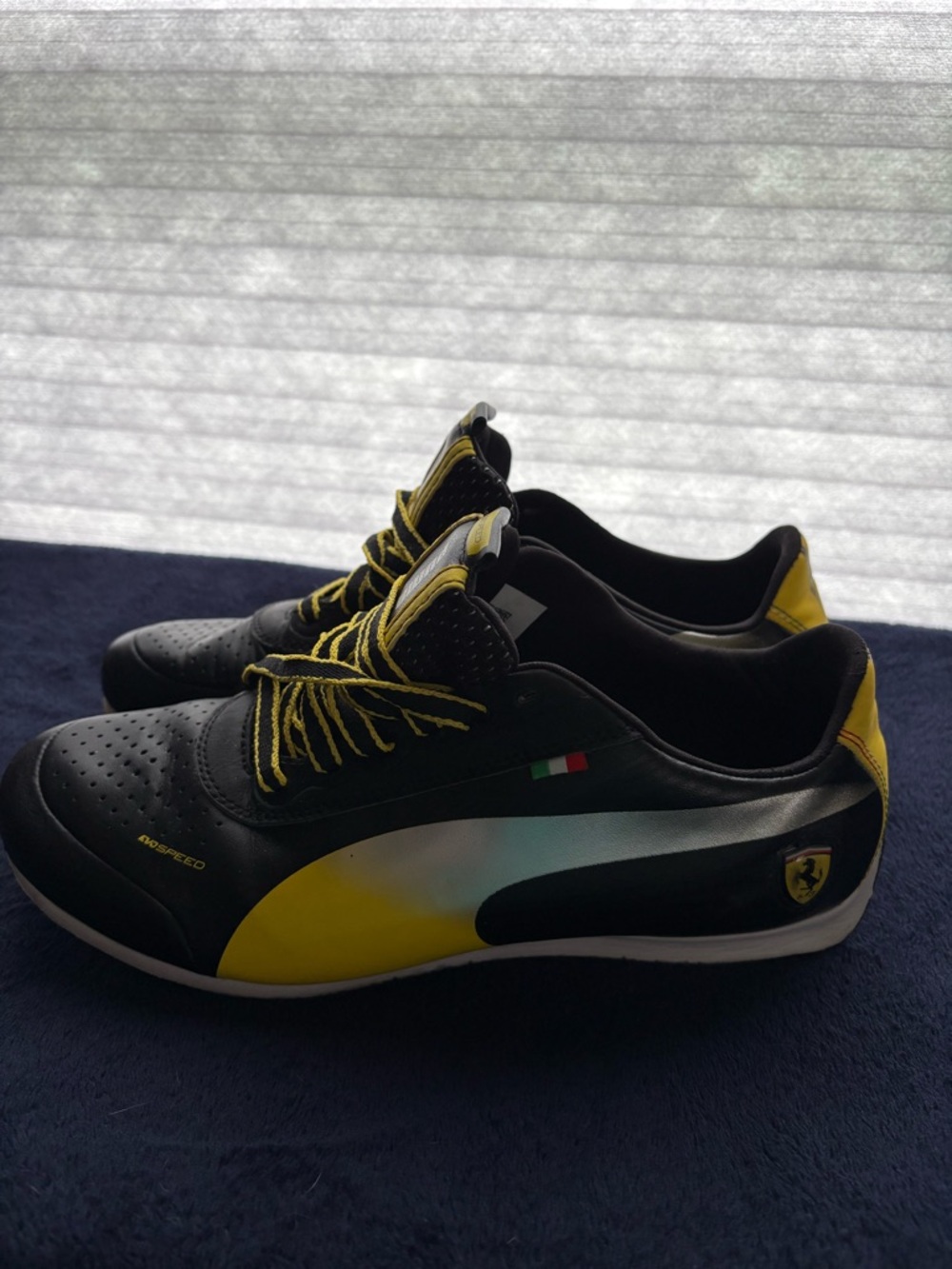 Puma Black and Yellow Men’s Racing-Inspired Sneakers